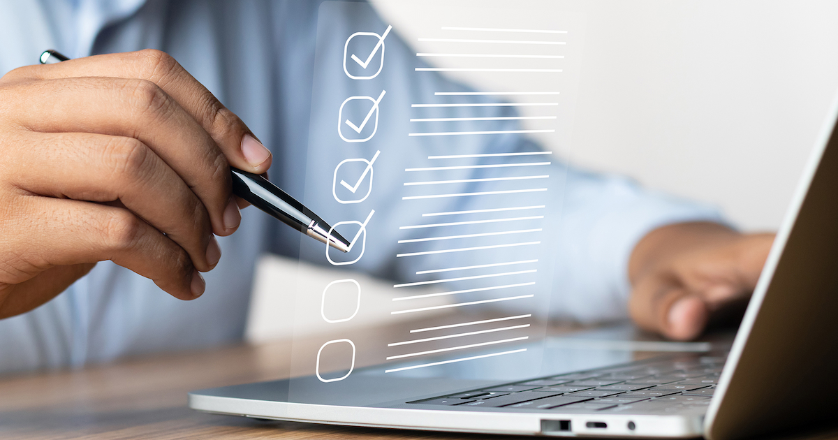 business person going through a check-list
